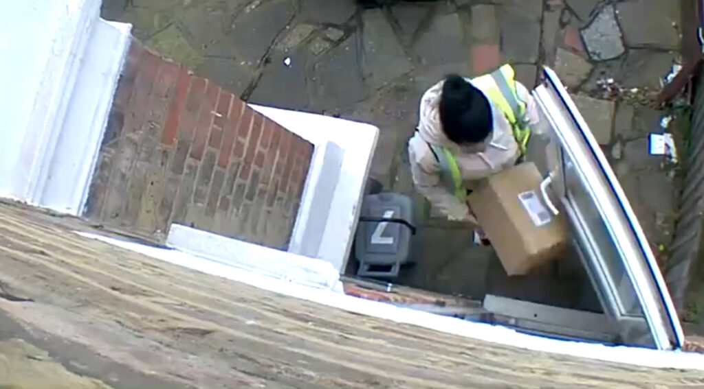 Evri driver drops parcel before kicking it
