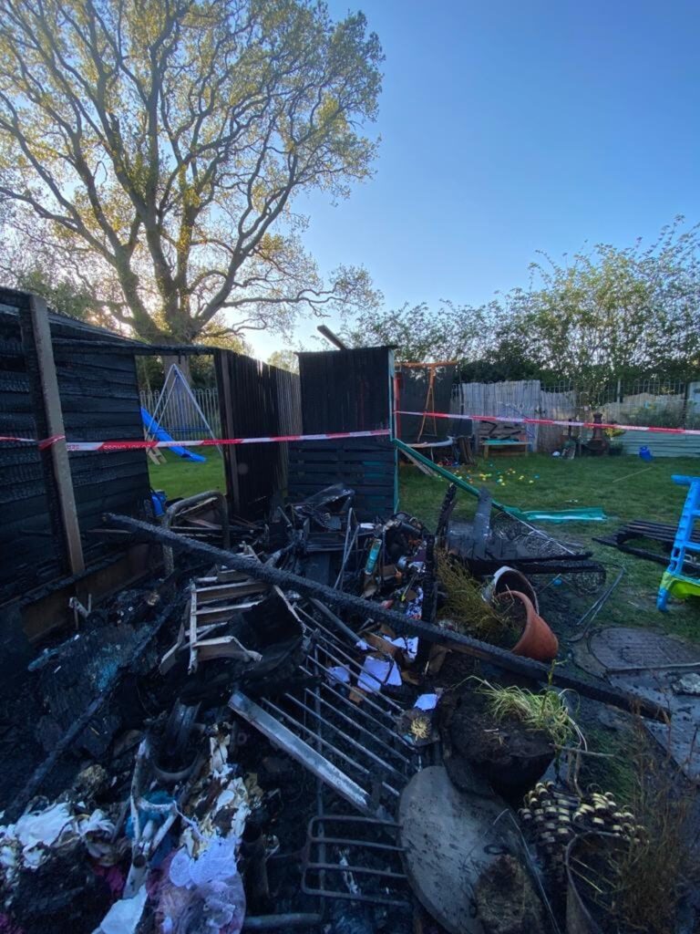 Burned objects were laid off in a pile and cordoned off