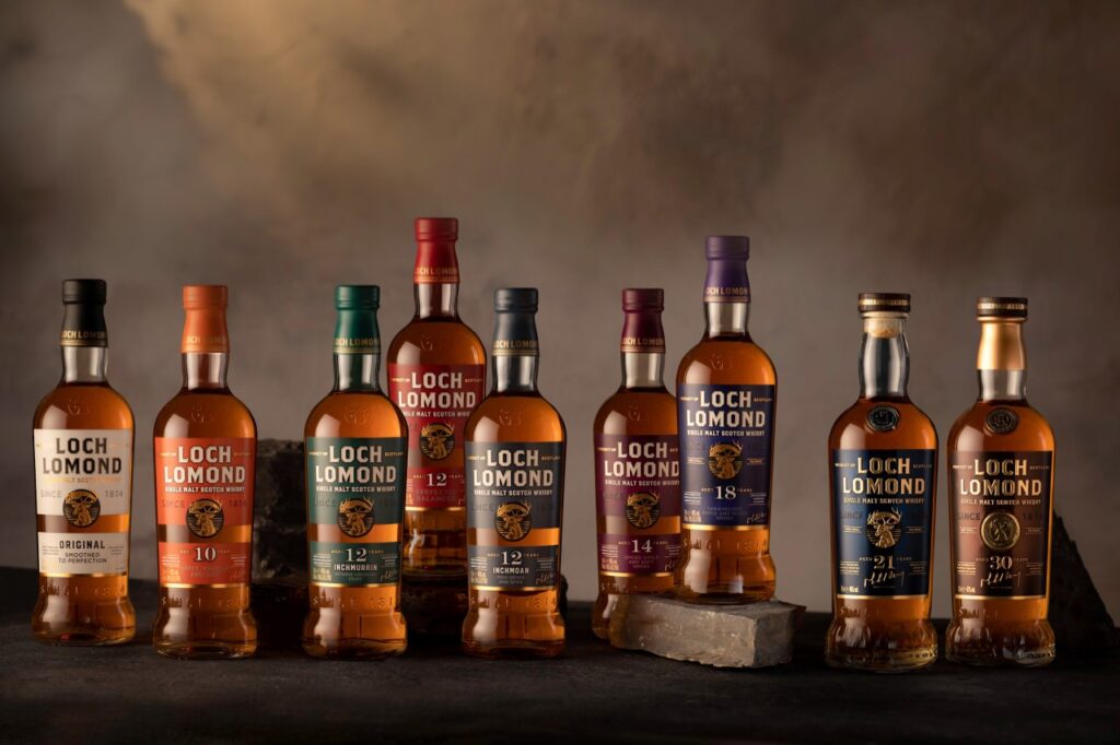 A row of Loch Lomond whiskey bottles with new packaging
