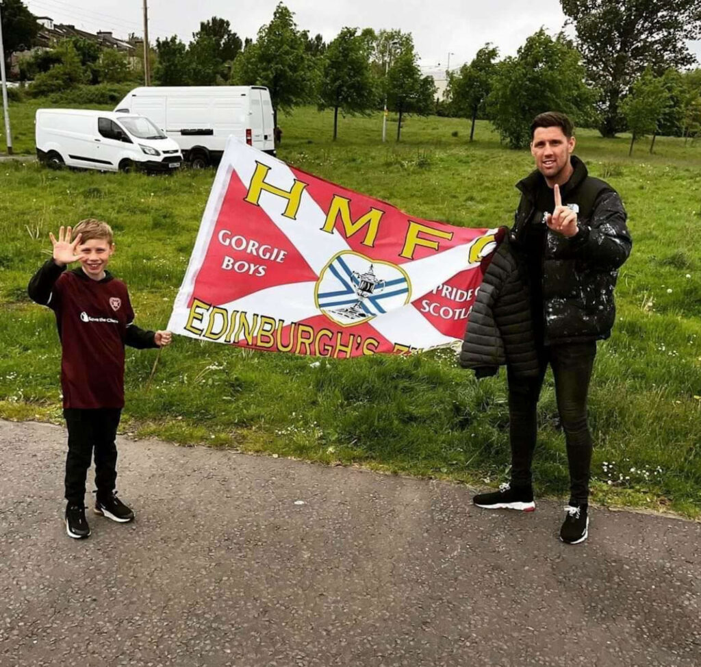 Jason and Lewis with a Hearts flag 