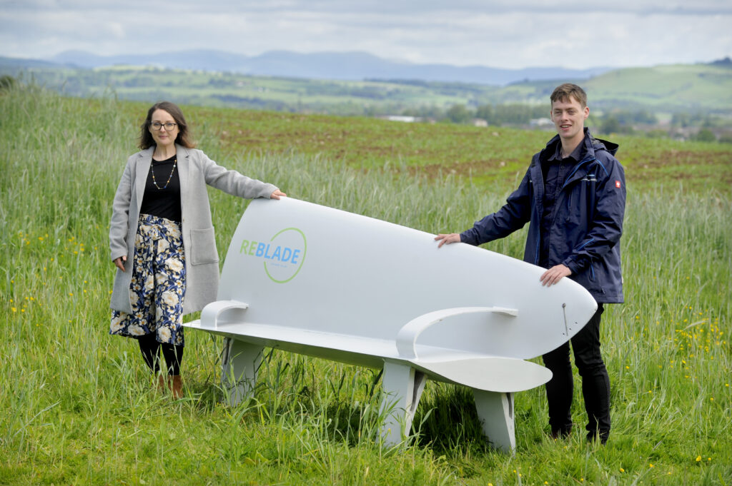 (L-R) Fiona Lindsay of ReBlade and Miles McConville of FOR with the ReBlade bench made from decommissioned turbine blades.
