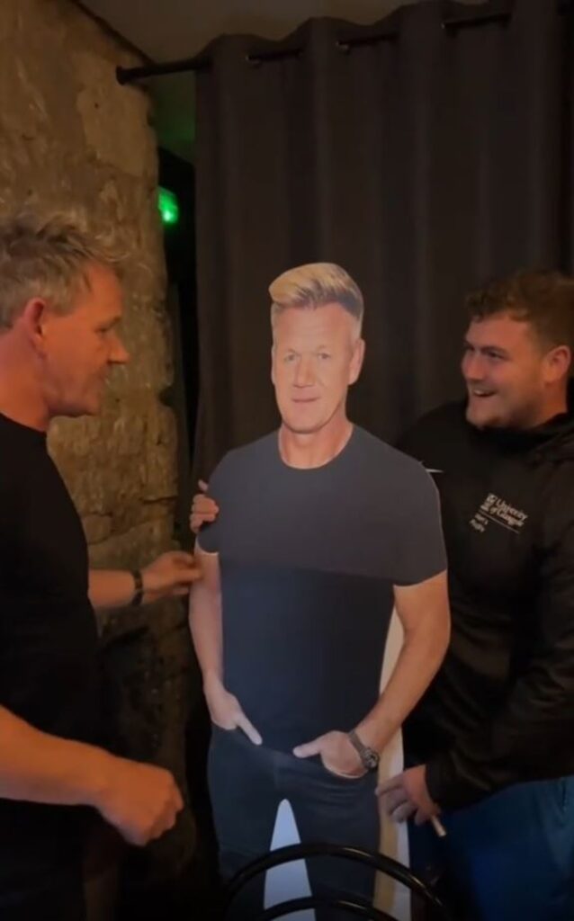 Gordon with the fan and the cardboard Gordon.