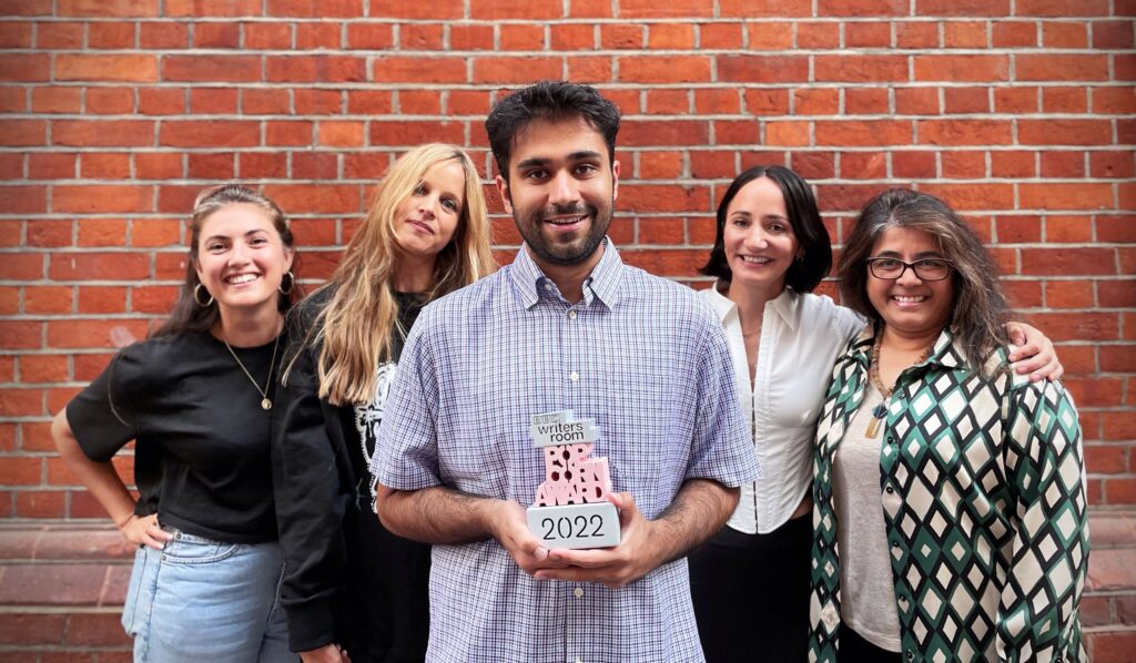 Karim Khan with his Popcorn Writing Award at this year's Edinburgh Fringe.