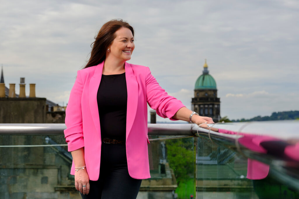 Photo of new IoD Scotland National Direcotr Catherine McWilliam overlooking Edinburgh.