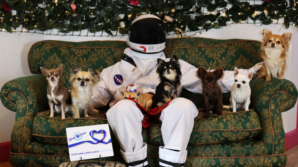 The BrawBand mascot, the Scots Spaceman, at The Chihuahua Cafe in Edinburgh to promote the Scotland Loves Local Gift Cards.