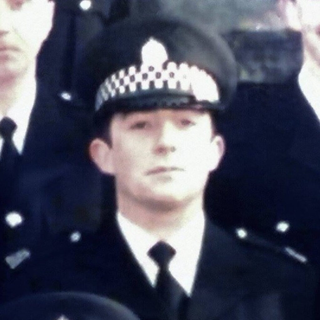 Denzil Meyrick dressed as a policeman 