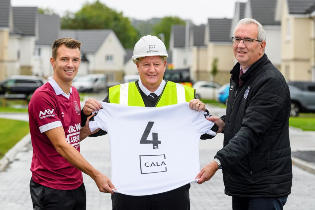 Linlithgow Rose FC captain Gary Thom (L) alongside David Stewart and Jon Mahoney (R).