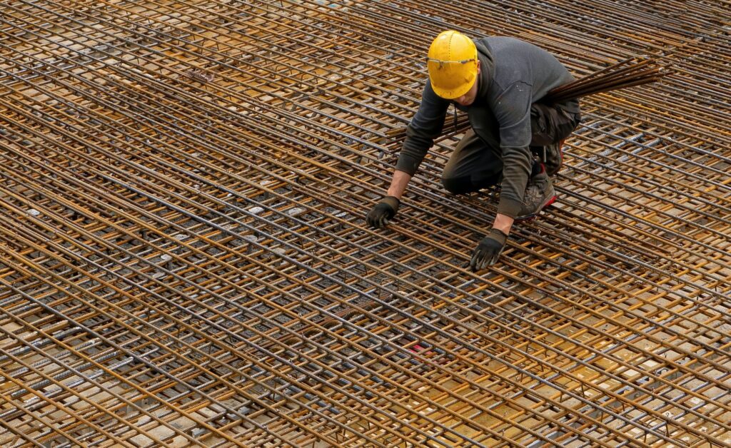 Man working on construction material.