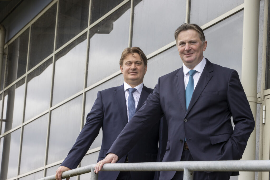Scots billionaire brothers Sandy and James Easdale pose for a photo at Greenock.