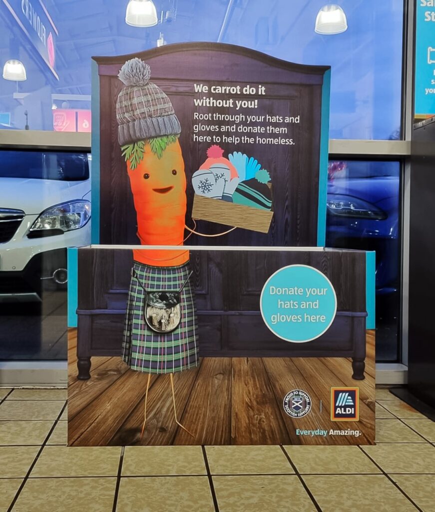 The Keep Kevin Cosy charity box in an Aldi store.