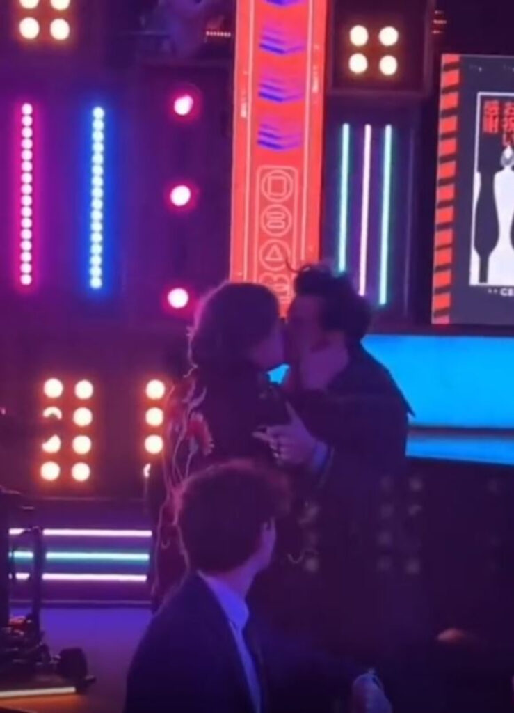 Lewis Capaldi and Harry Styles share a kiss