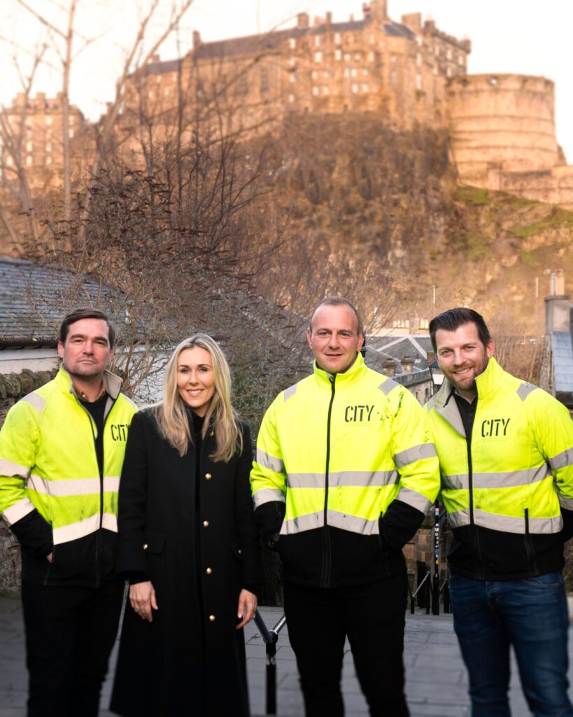 City Access Scaffolding team in front of Edinburgh Castle