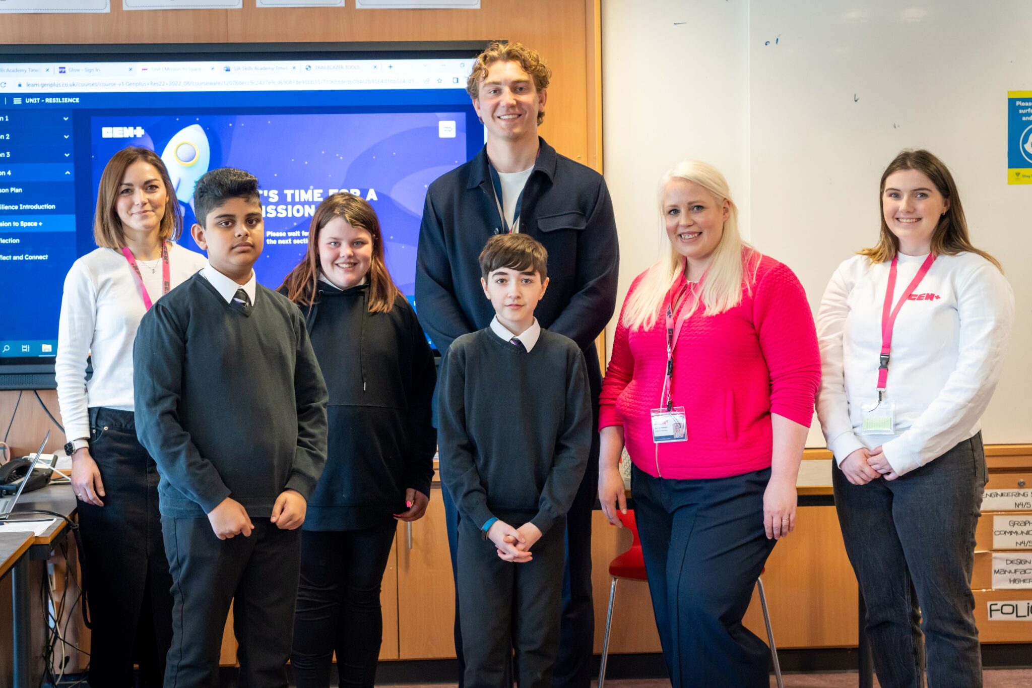 Jamie Ritchie with pupils and staff at St John's Academy