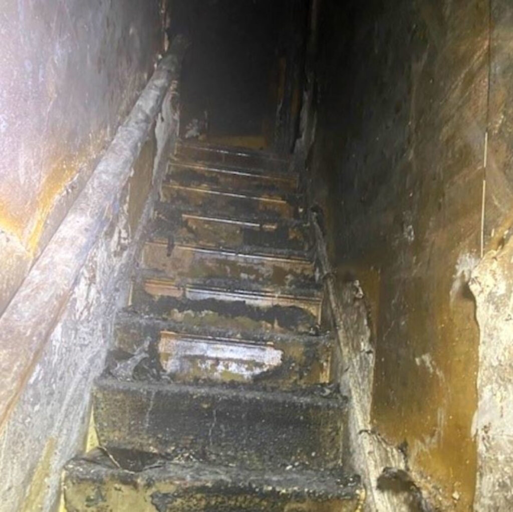 The destroyed staircase.