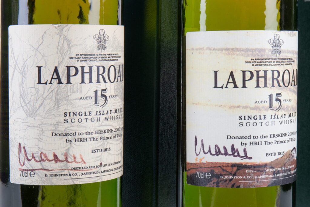Two bottles of Laphroaig signed by King Charles III.