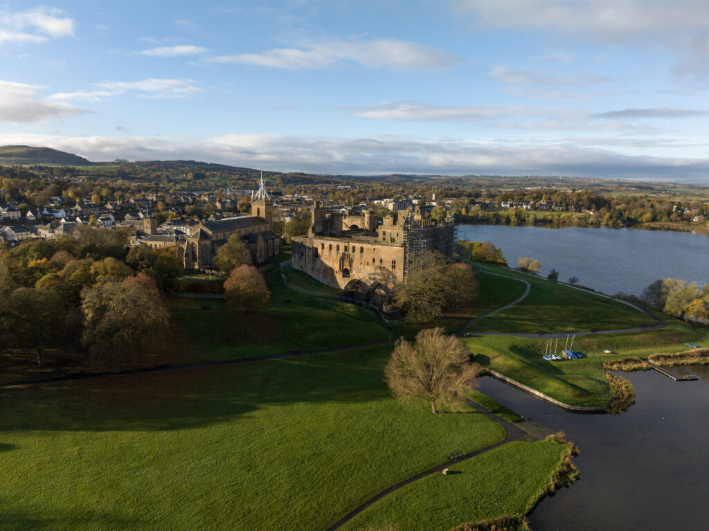 Aerial photography of Linlithgow Palace, Linlithgow taken with a Mavic 3 UAV (drone). The images show a large scaffolding erected in the North elevation of the building to support the stone work.