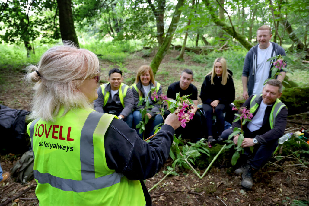 Lovell employees help South Lanarkshire Council staff with weeding.