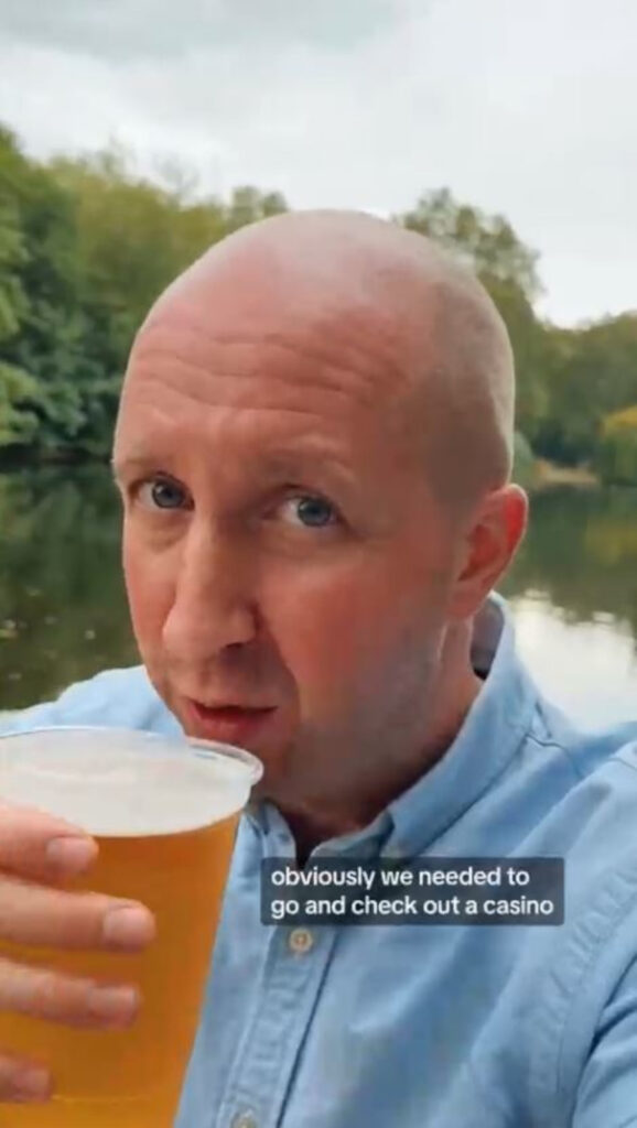 Phil enjoying a pint in the park.