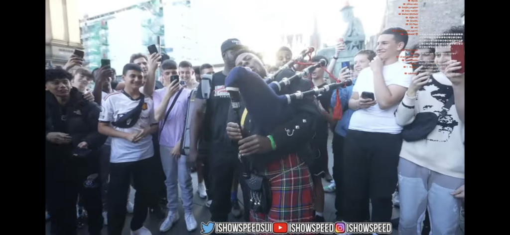 YouTuber IShowSpeed playing bagpipes on Edinburgh's Royal Mile