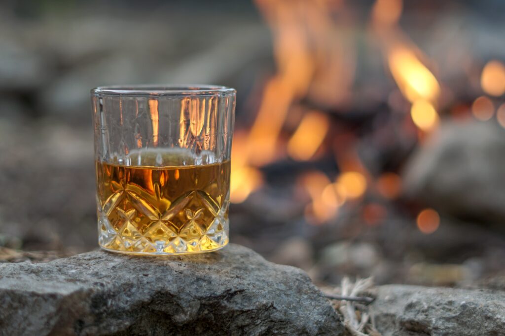 Whisky glass by fire