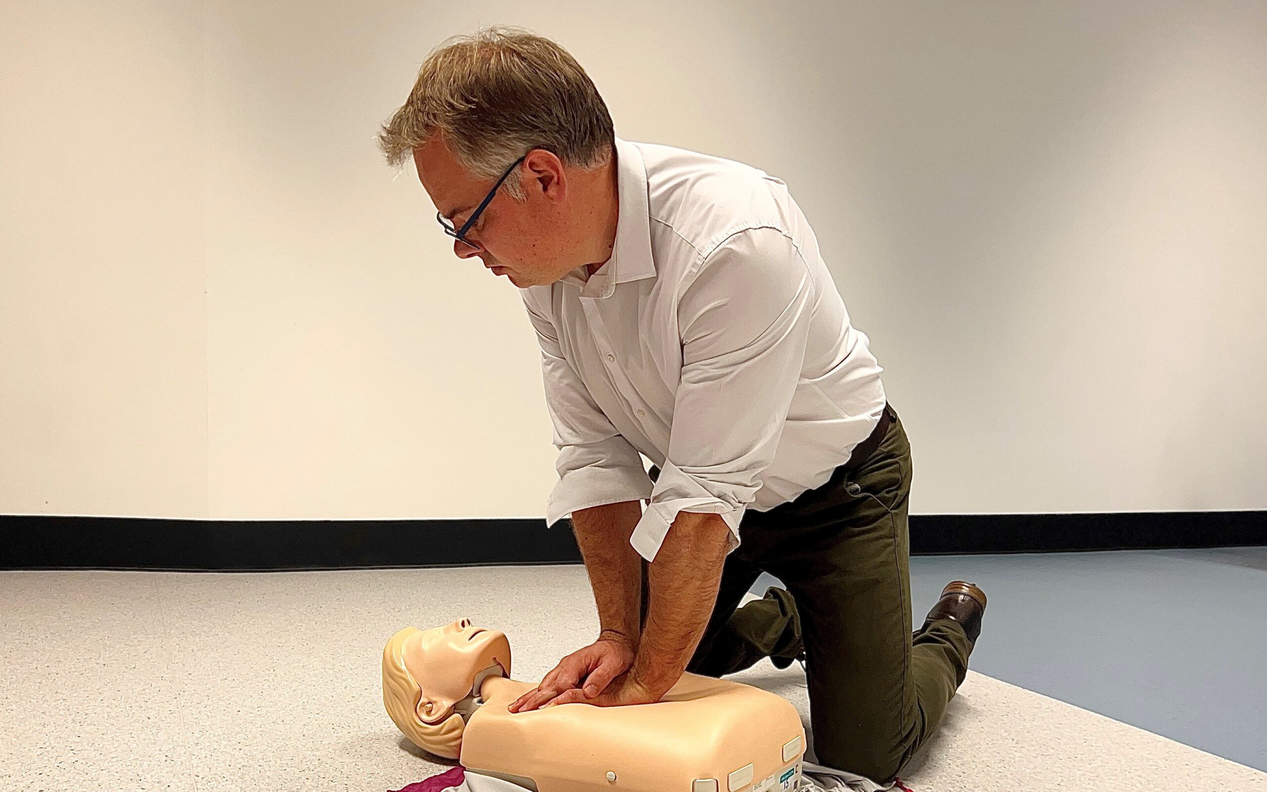 Dr Kevin Stirling, from the University's School of Health Sciences, demonstrating CPR on a teaching manikin.