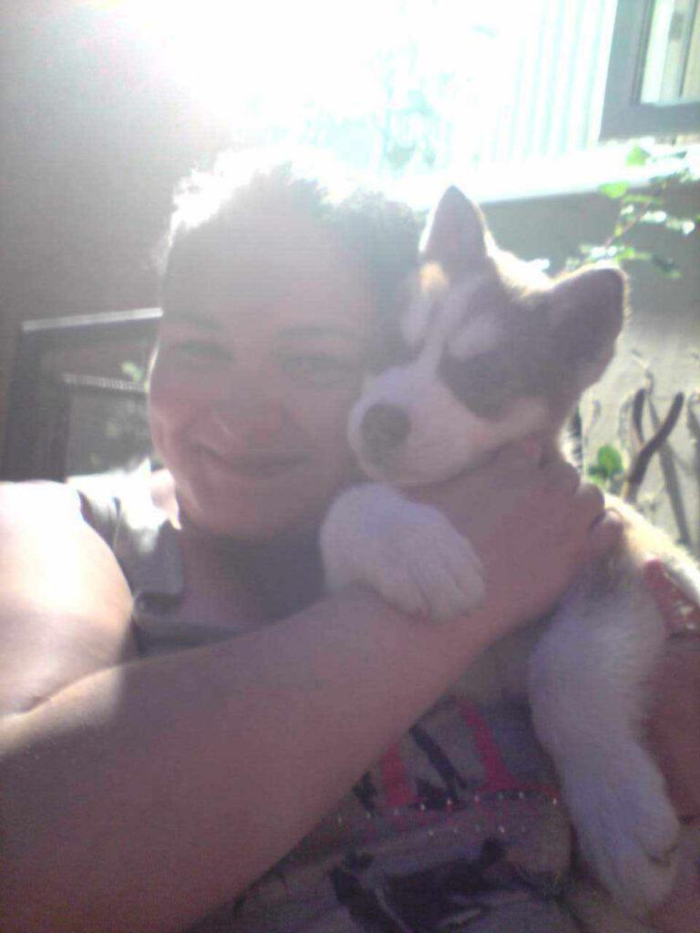 Julie Neade with one of the family's dogs.