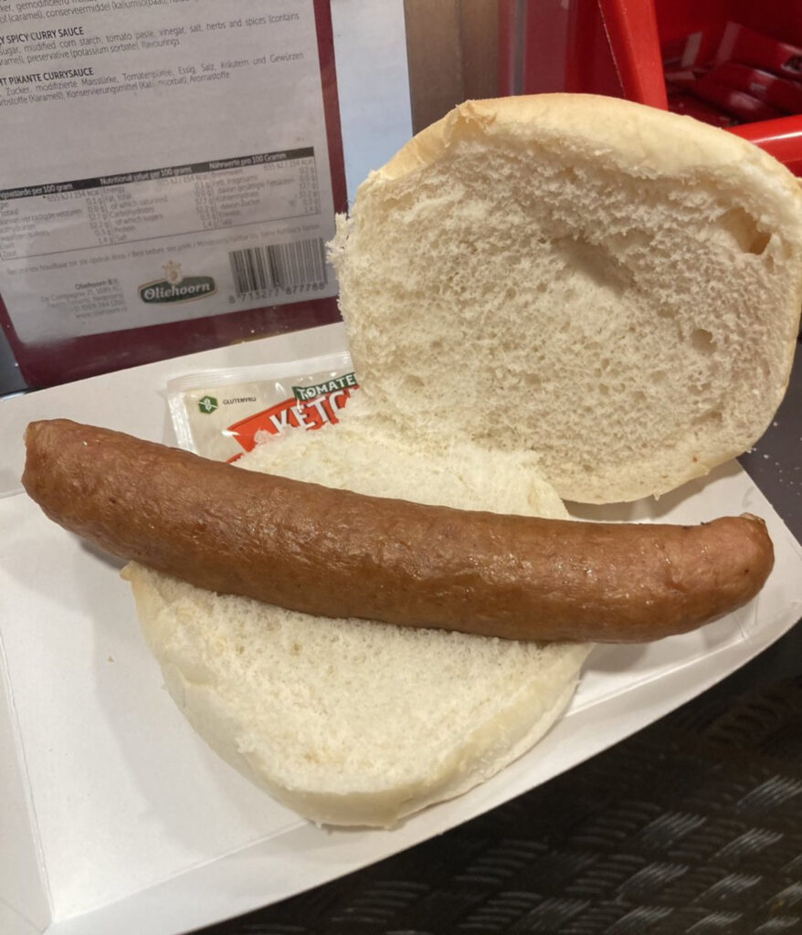The hot dog sausage in a burger bun