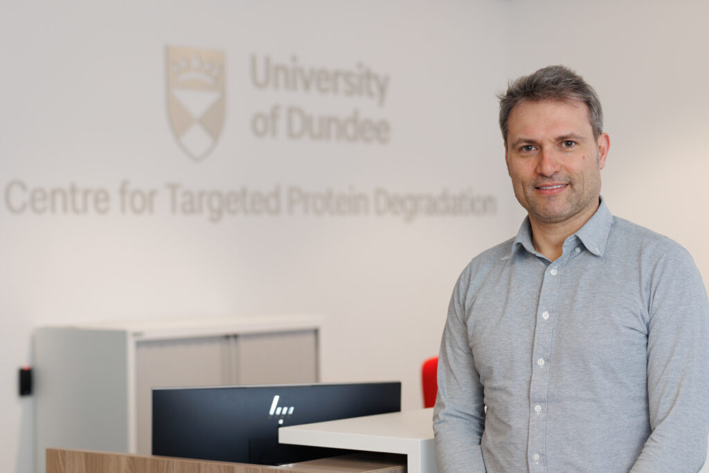 Professor Alessio Ciulli smiles inside Centre for Targeted Protein Degradation (CeTPD).