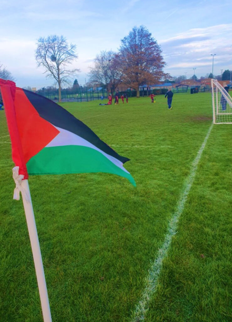 The match was forfeited after the opposition team spotted the flags.