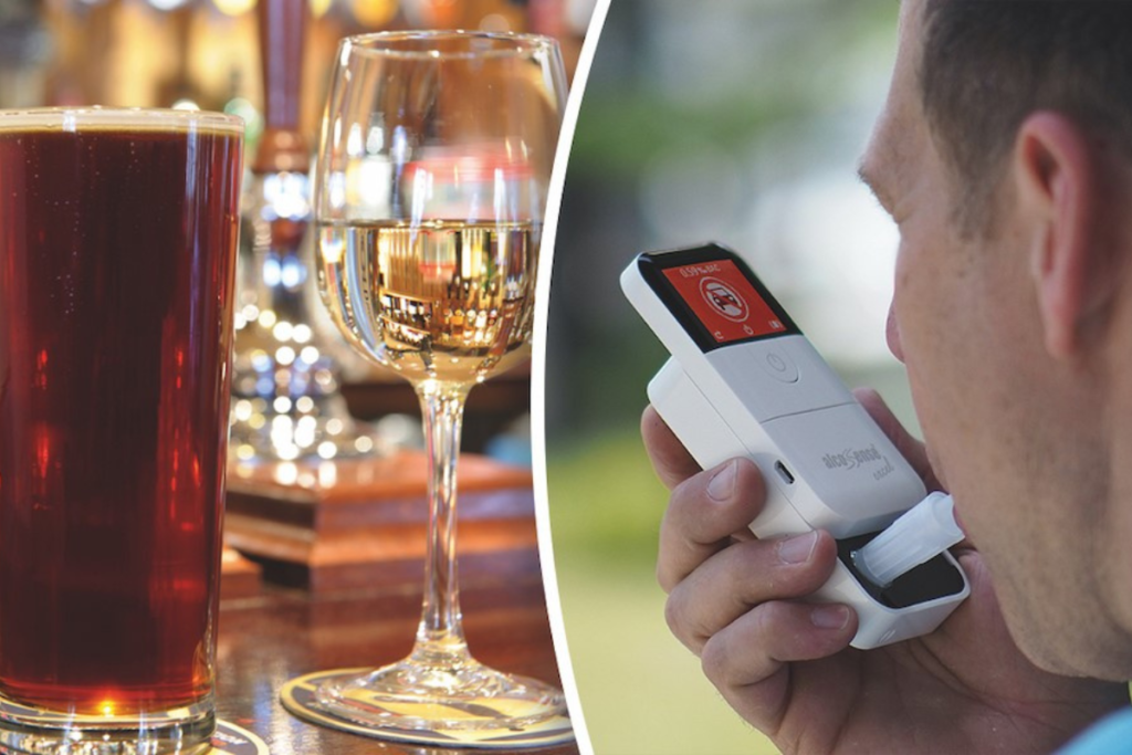 A glass of beer and wine alongside someone taking a breathalsyer test.