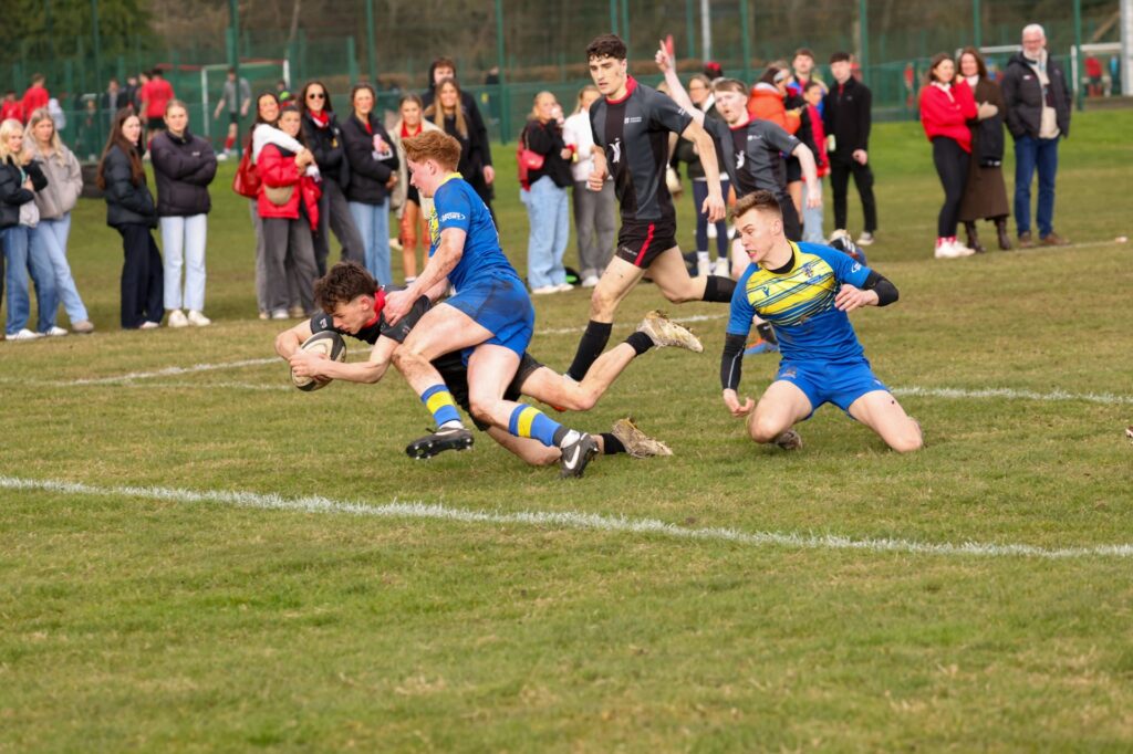 Students from Abertay University and the University of Dundee playing rugby.