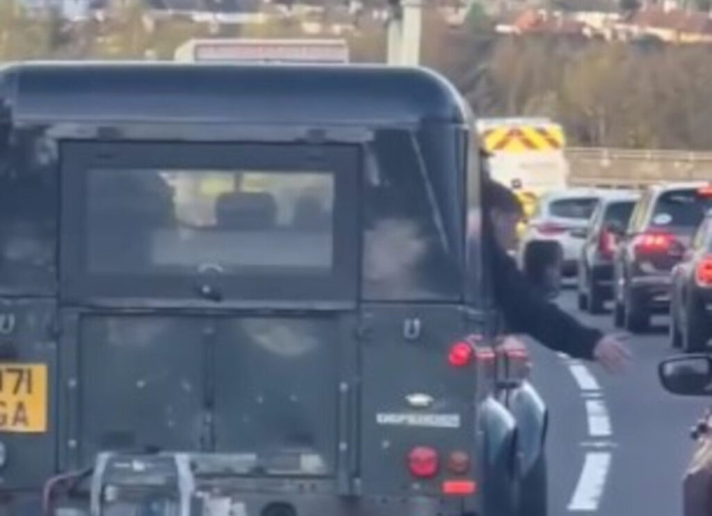 Land Rover driver leans over to punch wing mirror